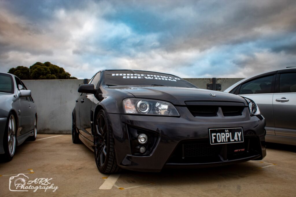 windscreen cover dot com modern size black with white writing black Holden 3