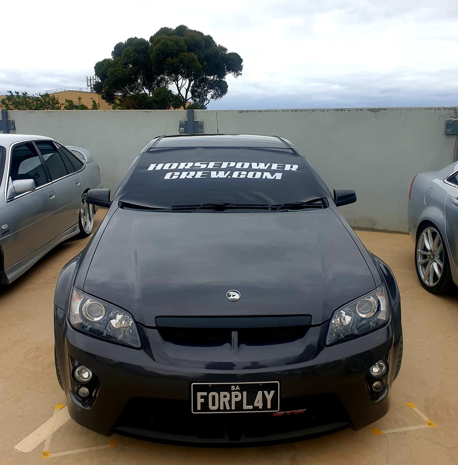 windscreen cover dot com modern size black with white writing black Holden