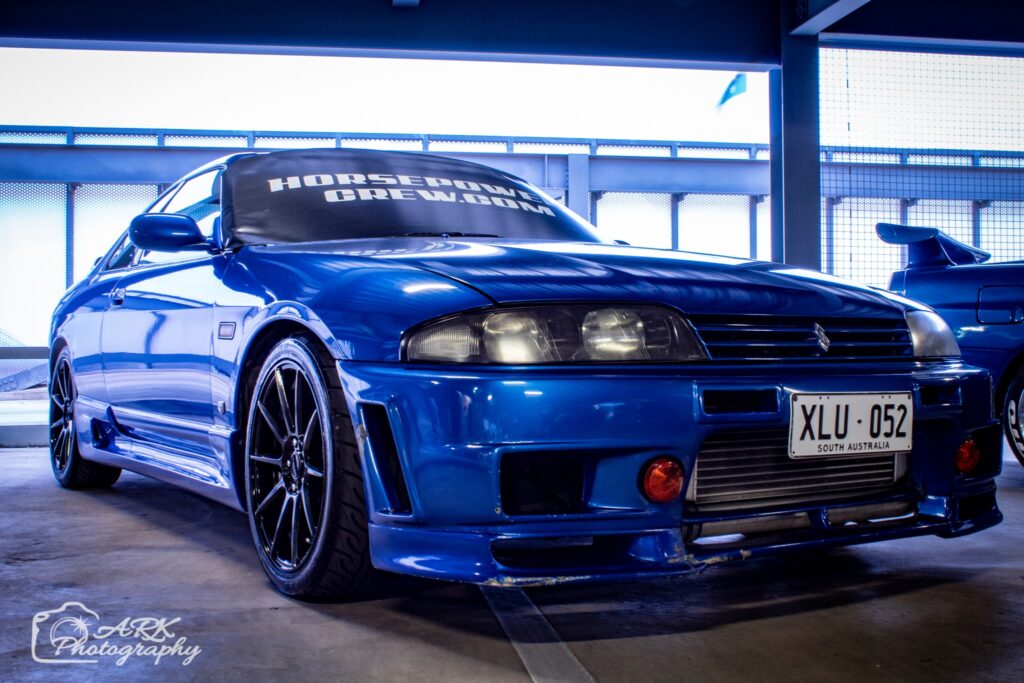 windscreen cover dot com modern size black with white writing blue skyline